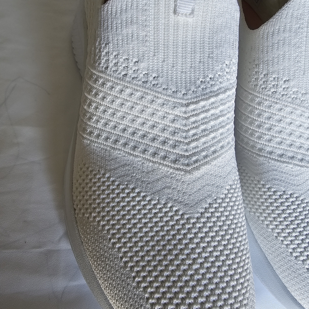 Skechers Women's White Slip-On Sneakers - Picture 3 of 16